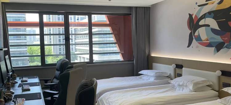 网鱼电竞酒店(扬州东站市民中心广场店)图片