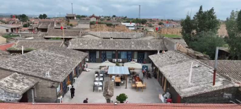 蔚县古堡伯院民宿(暖泉古镇店)图片