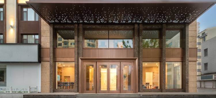 白玉兰酒店(佳木斯市火车站新玛特店)图片