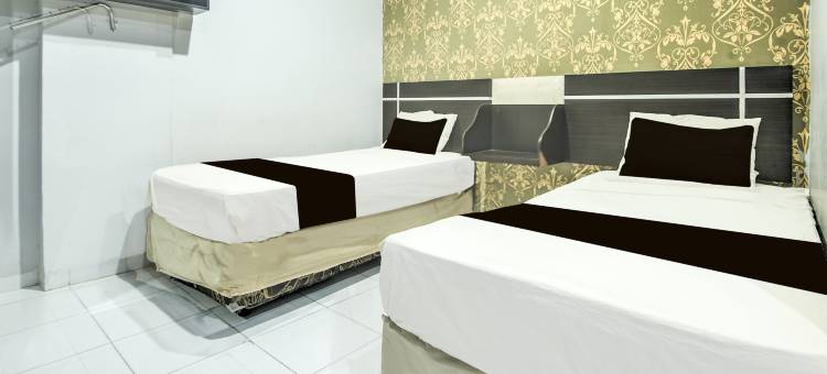 马卡萨O酒店靠近帕纳库康购物中心(原马卡萨幸运旅馆)(Hotel O Makassar near Mall Panakukang formerly Hotel Lucky Inn Makassar)图片