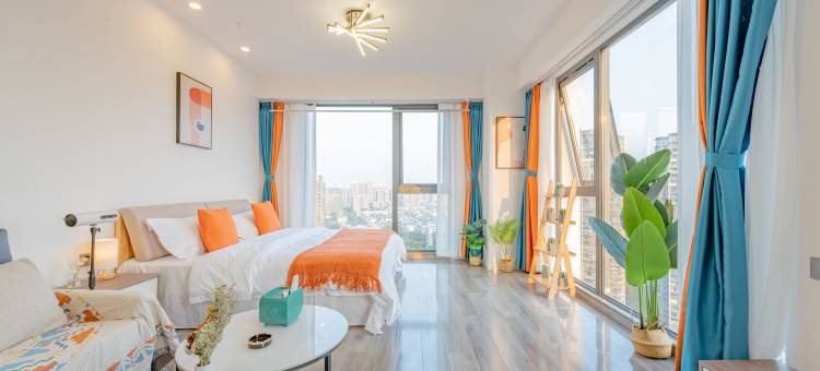 栖牛XINIU·投影自助公寓(乐山万达广场店)图片