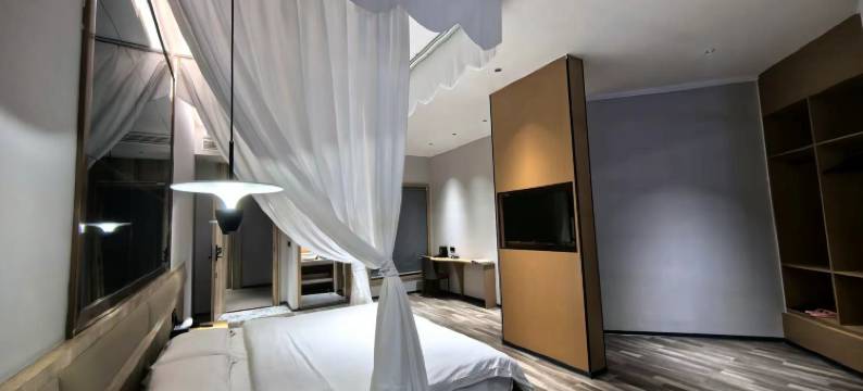 威远懒懒主题酒店图片