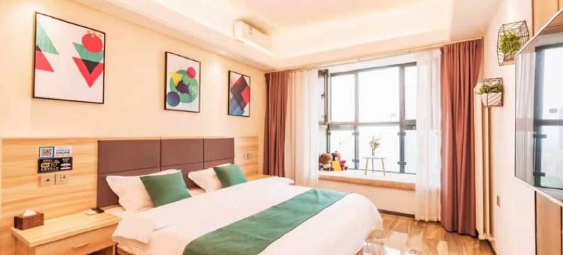 金茉莉时尚民宿(郑州中原福塔七里河地铁站店)图片