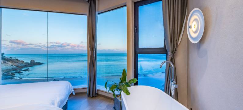 青岛印澜一宿·悬崖海景民宿(崂山风景区泉心河沙滩店)图片