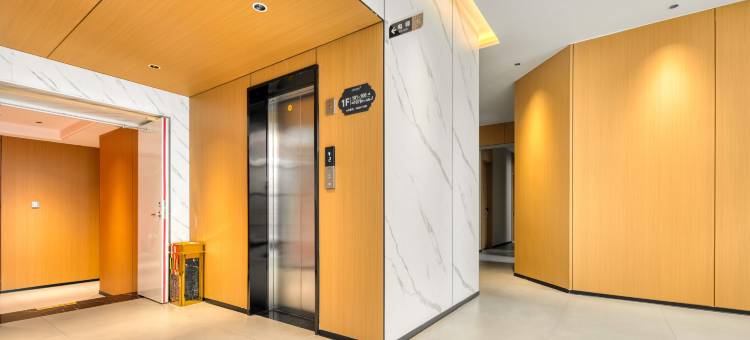 艾居家迎酒店(盖州市公安局店)图片