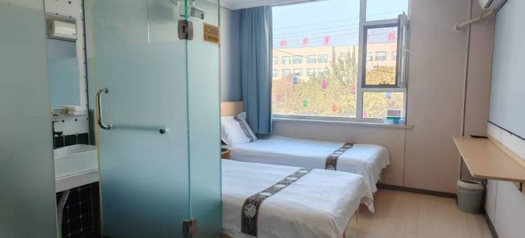 吉林爱家时尚宾馆(九站农校科技学院店)图片