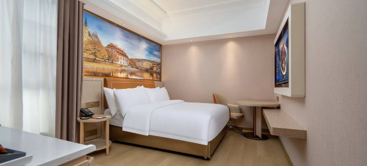 维也纳酒店(盘州南湖公园银杏广场店)图片