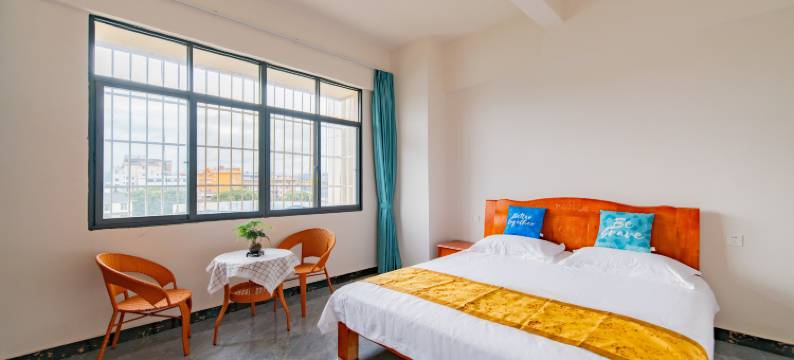 西双版纳景洪城悦·日月吉祥旅居民宿(嘎洒机场高铁站店)图片