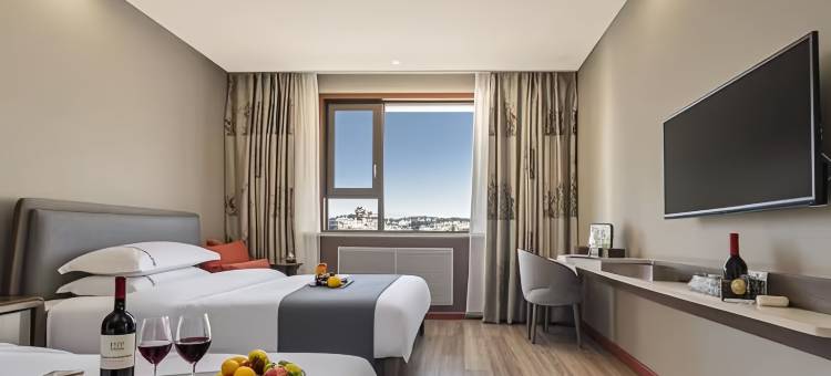 广源大酒店(沙洲夜市街敦煌博物馆店)图片