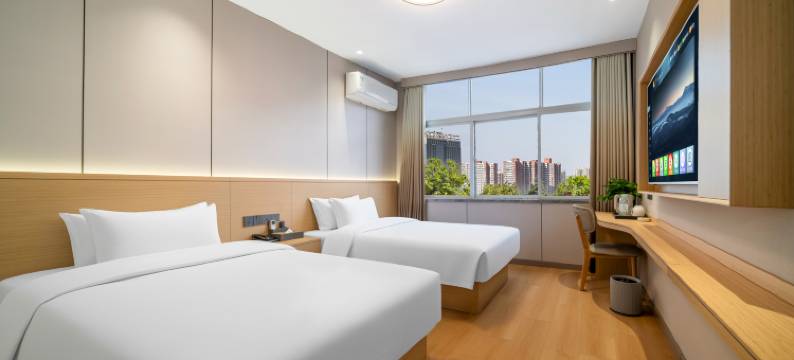 娅美酒店(新蔡喜盈门悦享城店)图片