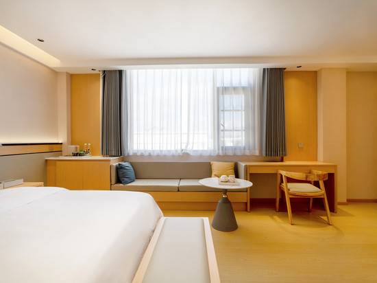 凰季酒店(文山州人民医院七都古镇店)