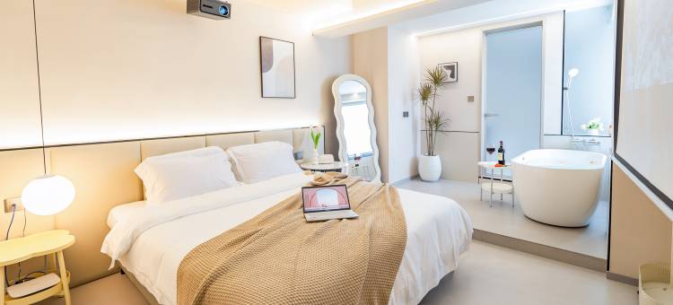 七里拾光·设计师私汤民宿(市中心苏宁广场店)图片