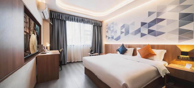 曼客阳光酒店(四川护理职业学院万达广场店)图片