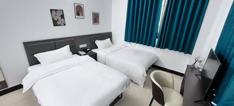 新里程商务酒店(下茆龙湾店)图片