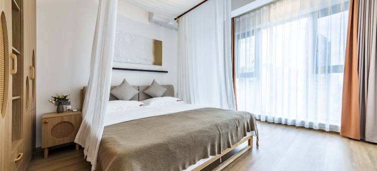 栖牛投影自助民宿(乐山高铁站店)图片