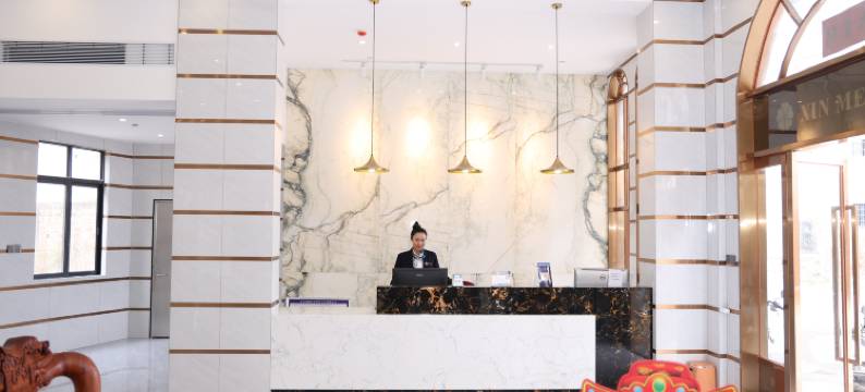 鑫梅宾馆(坡头镇人民政府店)图片