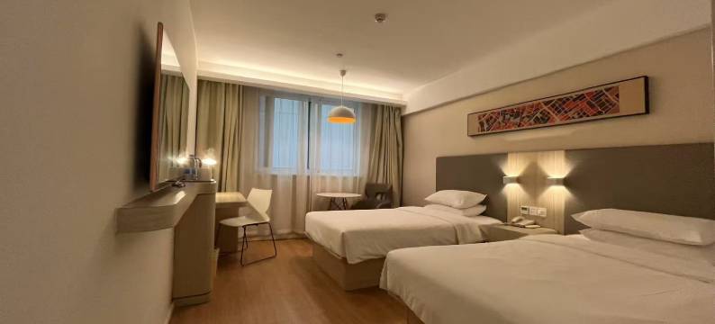 固镇浪漫旅程酒店(投资大厦店)图片