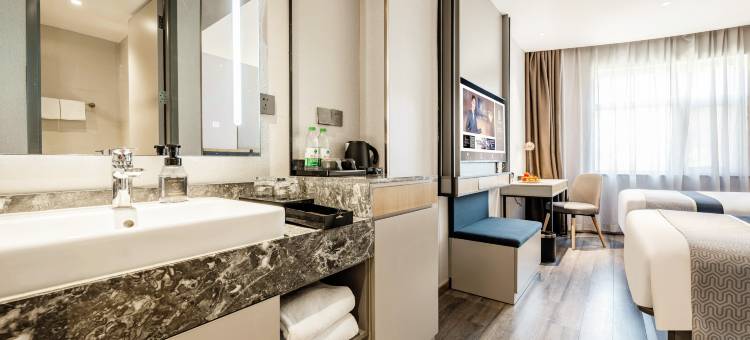 美豪R酒店(乌鲁木齐肿瘤医院小西沟地铁站店)图片