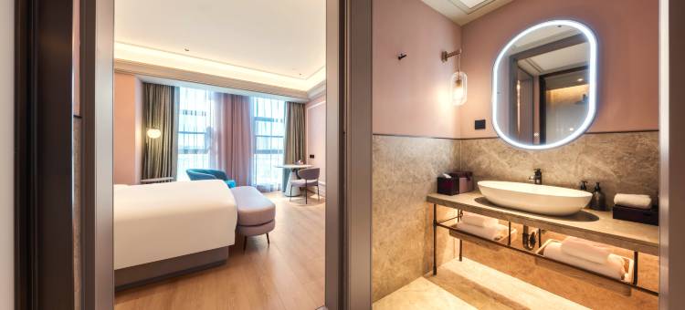 信阳宝鹏广场美居酒店图片