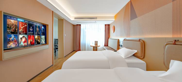 金桔酒店(联盛快乐城火车站店)图片