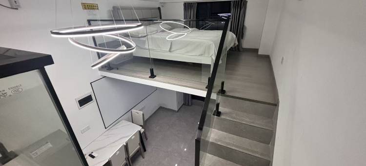 沐风•轻奢影院loft公寓(力高雍湖国际鱼尾洲地铁站店)图片