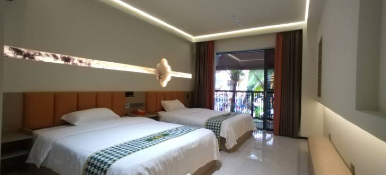 米娅雨林美宿酒店(告庄西双景星光夜市店)图片