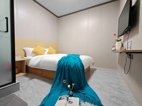 橙子时光民宿(开封清明上河园店)图片