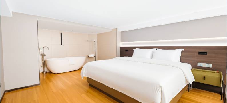 曼陀伦Plus智能酒店(江门和兴广场五邑华侨广场店)图片