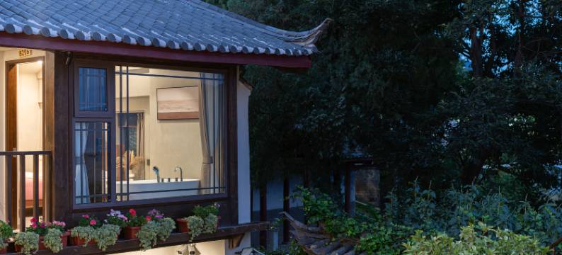 丽江古城漫庭丨绿杨里天空之城侘寂风设计师观景民宿(五一街店)图片