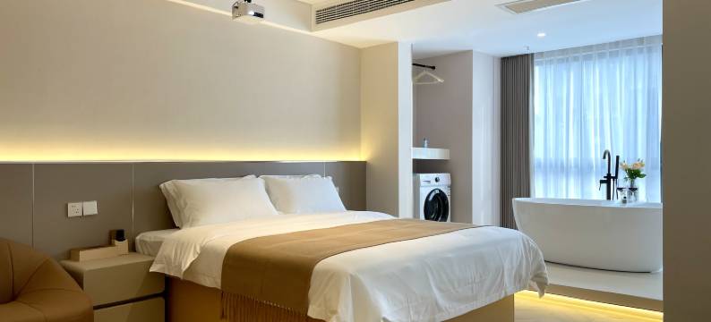 沐光美居·高空影院美宿(广安吾悦广场店)图片