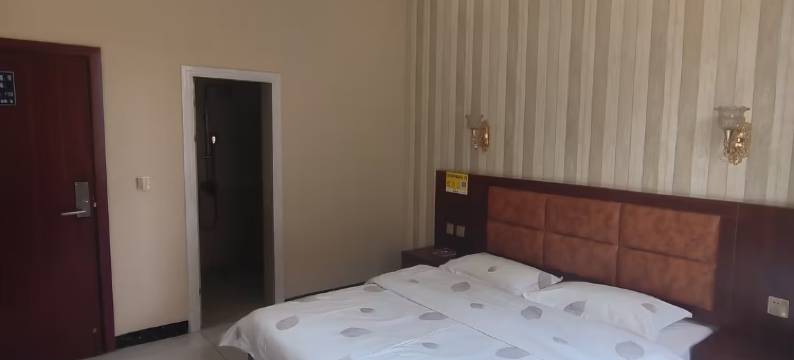 万佳宾馆(弥勒站店)图片