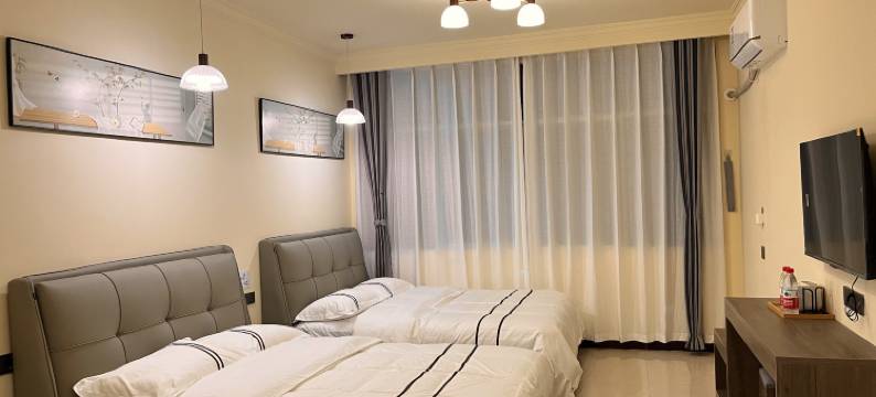 六盘水市钟山区昀扬酒店(凉都体育中心店)图片