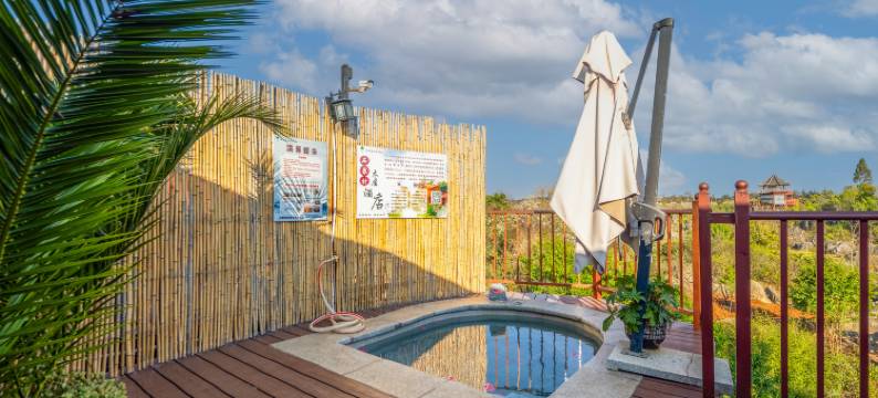 石林石泉村木屋酒店图片