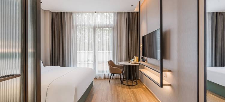 艺龙万国酒店(无锡荣巷地铁站梅园景区店)图片