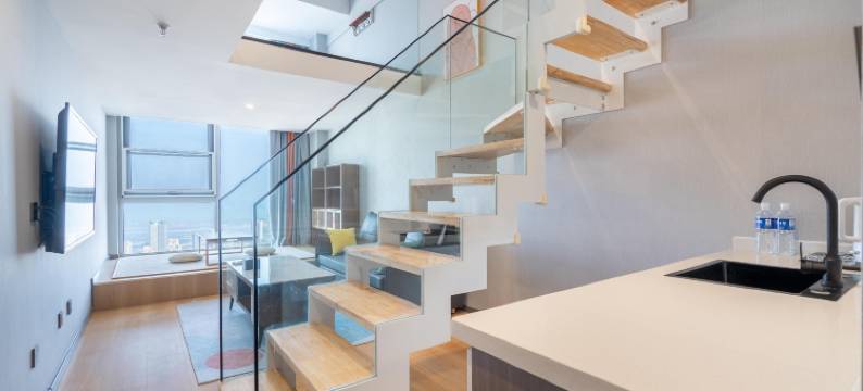 全橙·乐喜LOFT海景智能影院公寓(日照高铁站华润万象汇店)图片