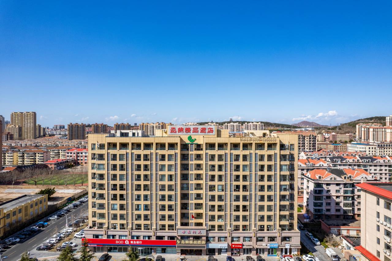 丞锦精品酒店(威海高铁北站欧乐坊夜市店)