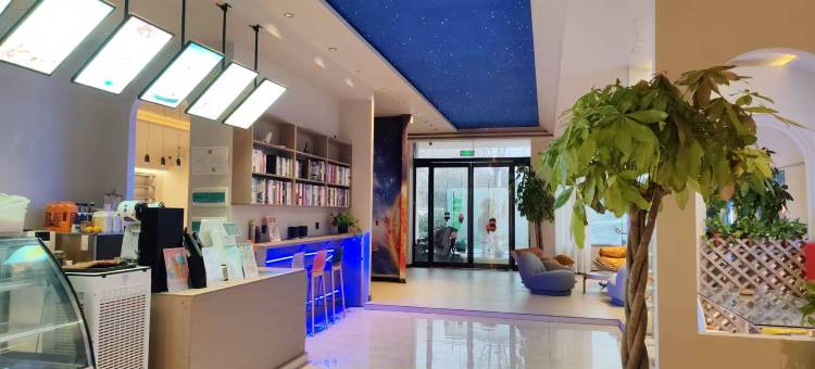 容悦轻居酒店(河南青华中英文学校店)图片