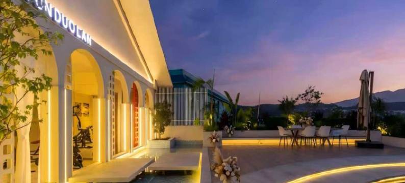 云朵蘭锦鲤花园泳池酒店(西双版纳景洪勐泐大佛寺店)图片