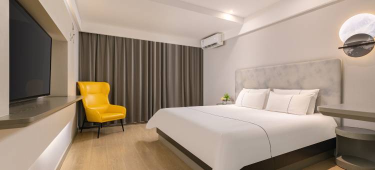 白玉兰酒店(琼海万泉河环球春天广场店)图片