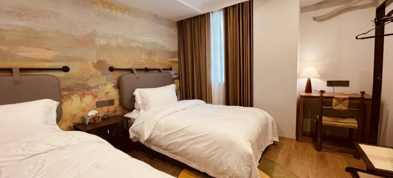 萤火虫软装民宿(市政广场店)图片