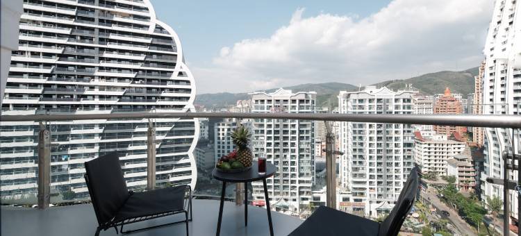 寰宇曼汀酒店(景洪告庄西双景星光夜市店)图片