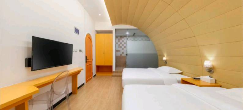 七玺城际酒店(郑州省体育中心地铁站店)图片