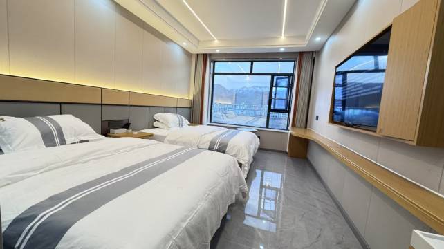 丁青县东洛热巴大酒店