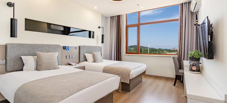 都市118精选酒店(青岛仰口海水浴场店)图片