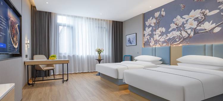 白玉兰酒店(平南中心广场店)图片