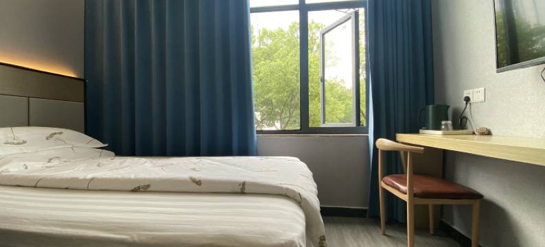 茸华宾馆(上海松江体育中心地铁站店)图片