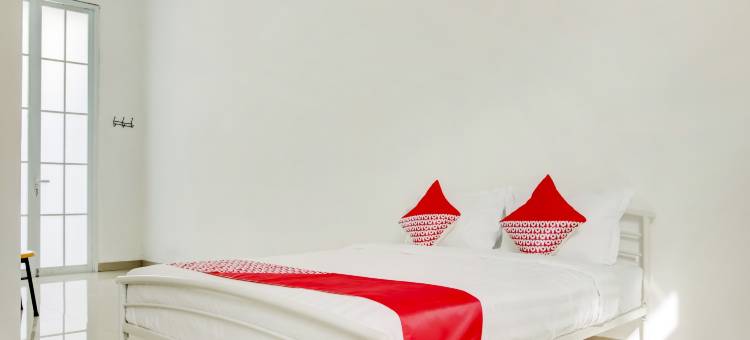 Hotel O Golden White House Near Mall Panakkukang图片