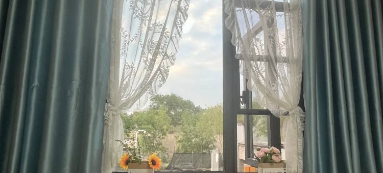 青柚民宿(开封万岁山武侠城清明上门园店)图片