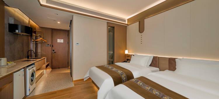 唯鑫锦中居酒店(锦州中央南街红星美凯龙店)图片