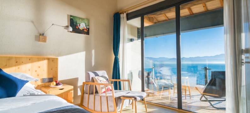 晏坐湖景清奢民宿(泸沽湖猪槽船游湖大落水村店)图片